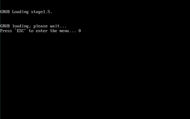 図2　GRUBのPress `ESC' to enter the menu...